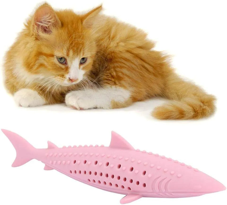 Green fish-shaped silicone cat chew toy with breathable side holes for catnip scent