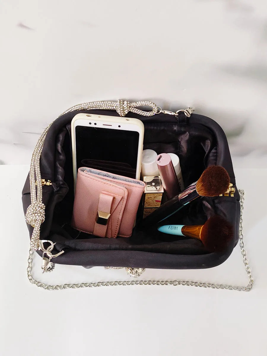 Women's soft polyester shoulder messenger bag with decorative folds, diamonds and chains in shell shape