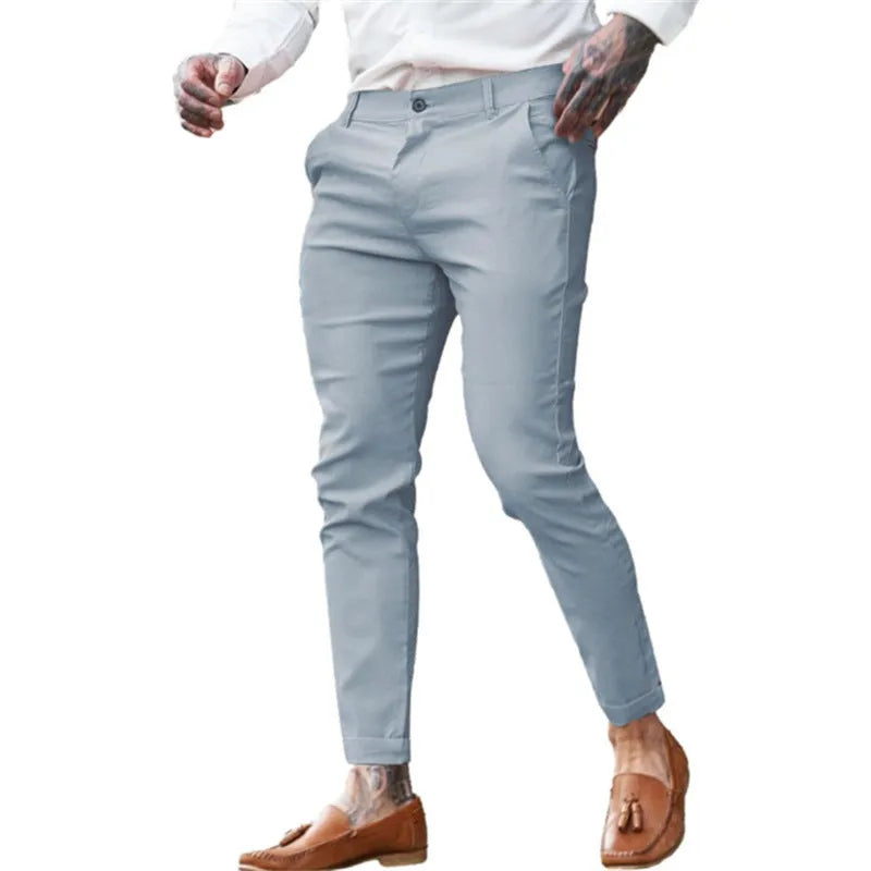 Men's slim-fit cotton stretch pencil pants in twill fabric showing high elasticity and pencil silhouette