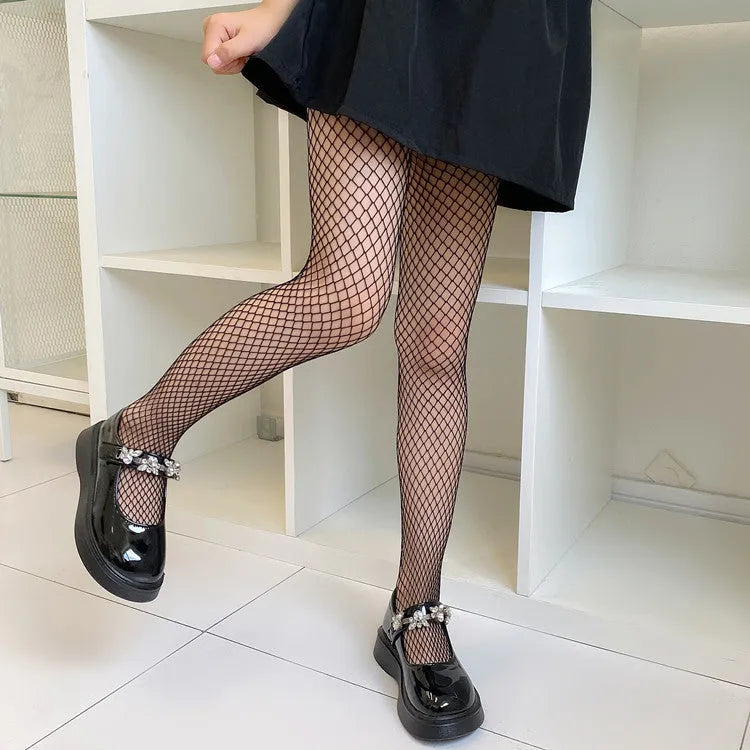 Women's black and white mesh stockings in large, medium, and small net patterns.