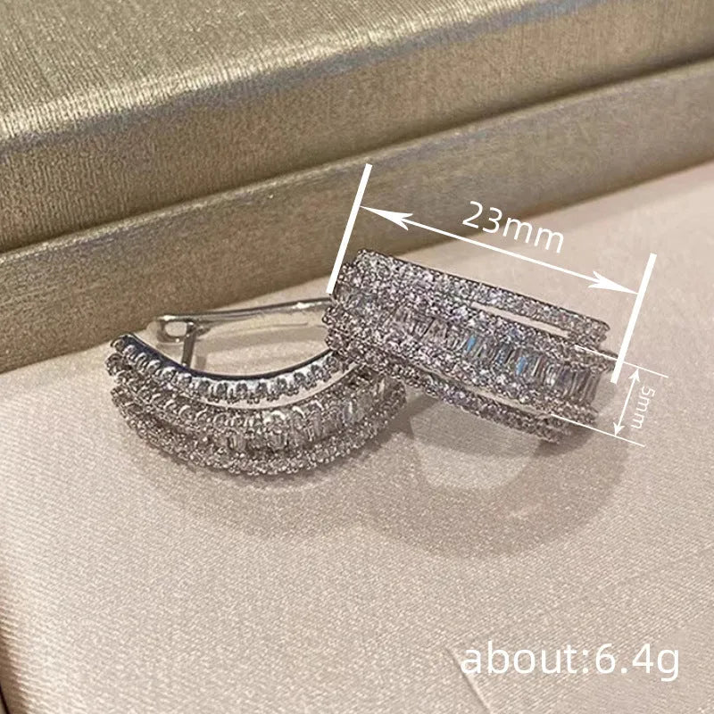 Geometric copper stud earrings with white gold plating and inlaid zircon stones