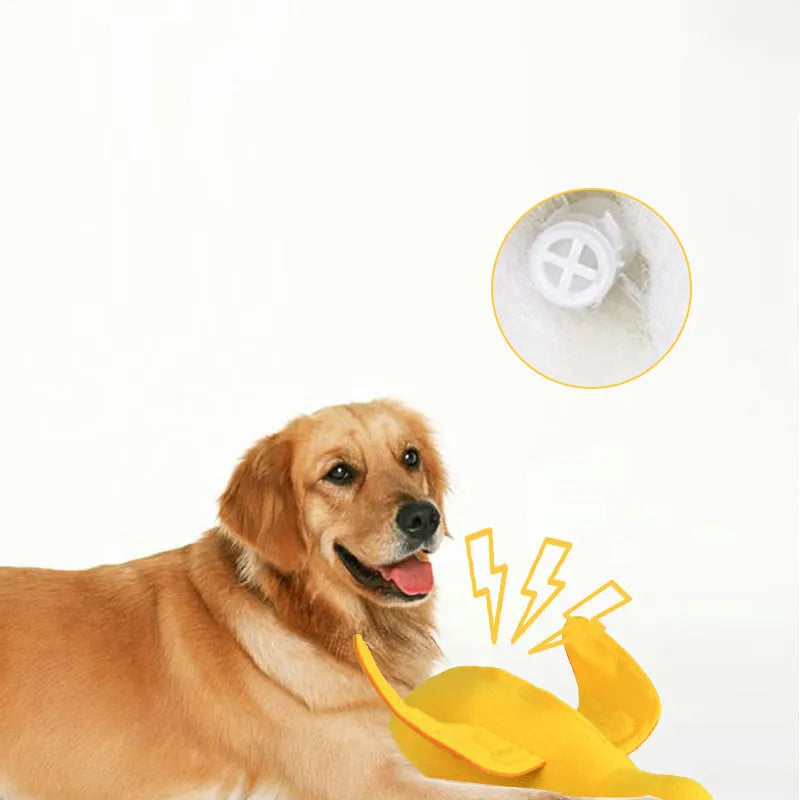Yellow teddy dog toy with central duck doll, featuring a squeaker and treat leak compartment.