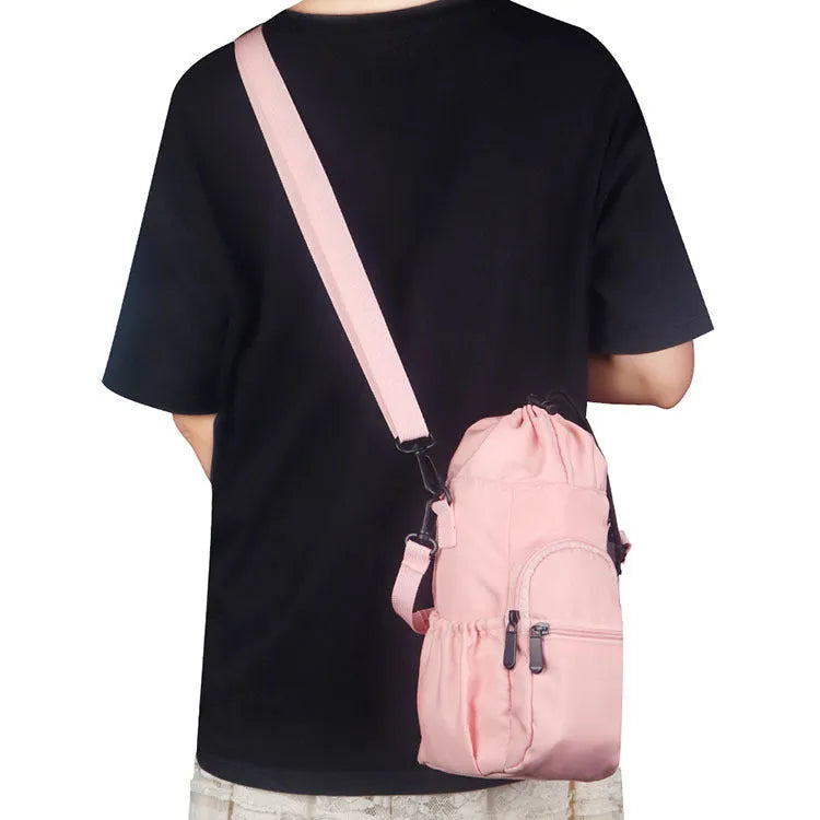 Cloth crossbody water bottle pouch shown in black, green, and pink colours with an adjustable strap.