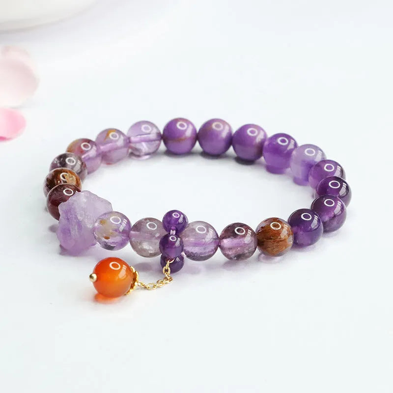 Natural nine purple crystal bracelet with amethyst beads and red agate accents in Mori style