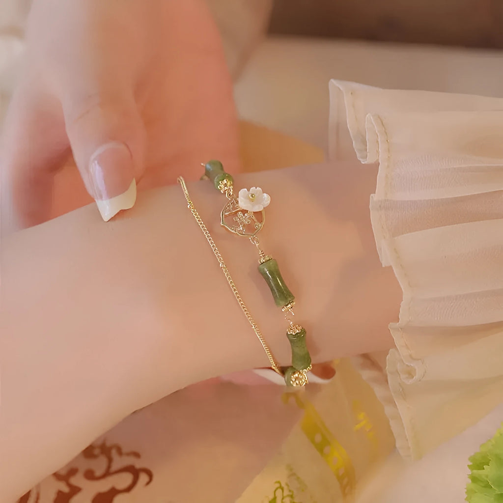 Handmade natural olivine bracelet with double layer Twin Bells of Ireland design and olive branch elements