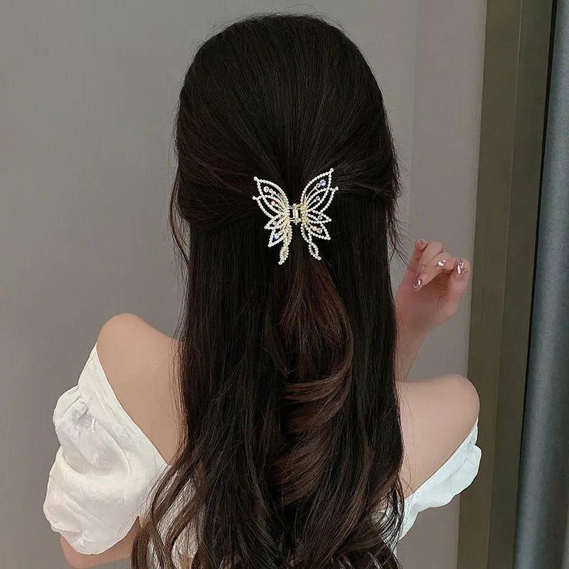 Butterfly hair clip for women with alloy construction and electroplated finish in rhinestone or pearl style