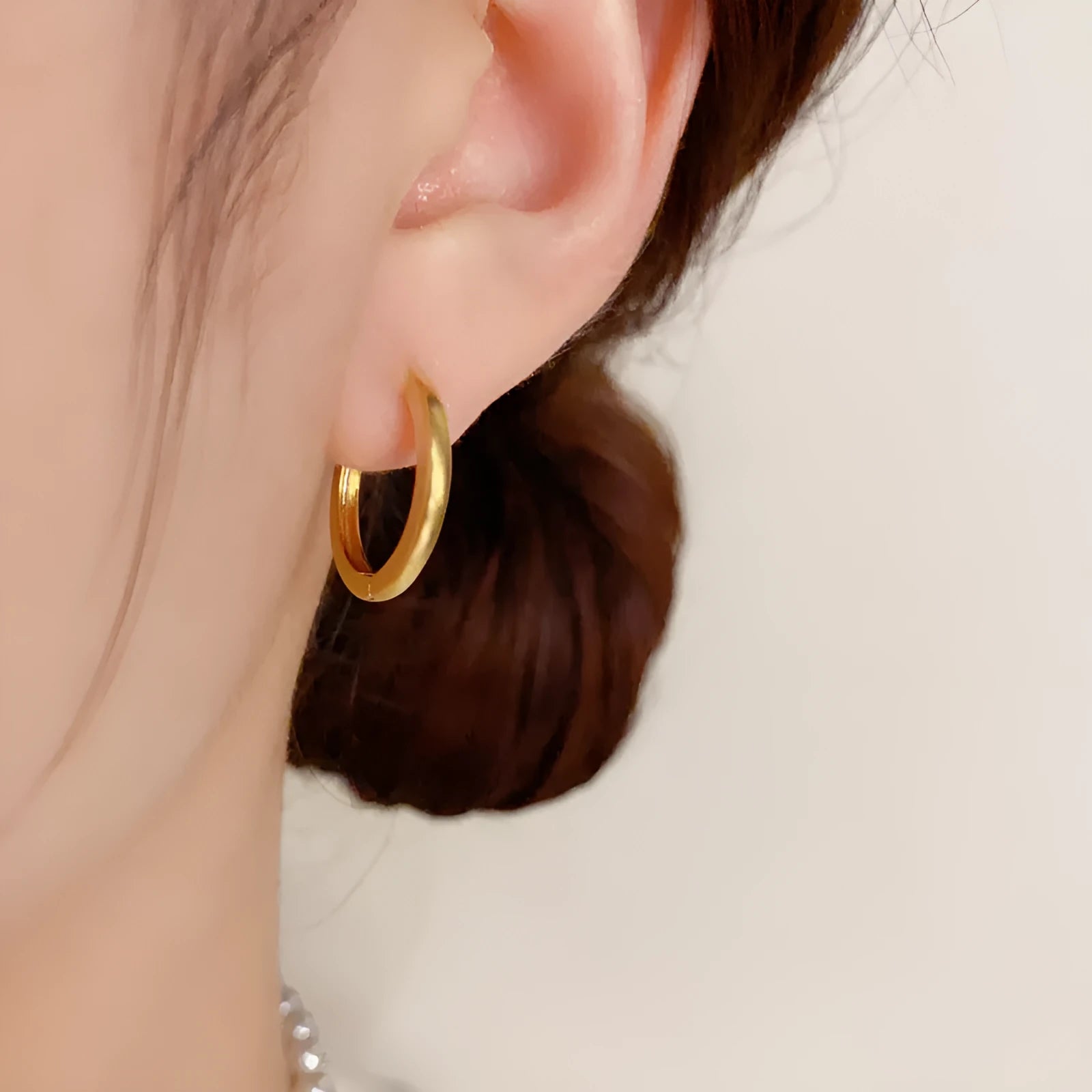 Geometric circular ear clips with gold plating in gold and silver colour options