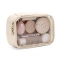 Leather transparent cosmetic bag showing interior compartments with waterproof PVC construction