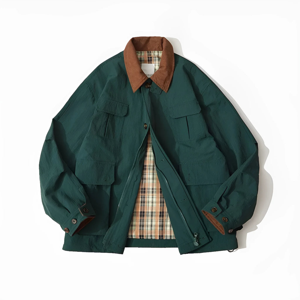 Green casual polyester jacket for men and women with side pockets on a hanger.
