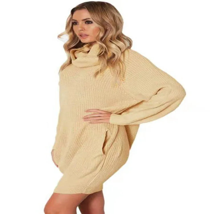 Women's apricot loose-fit pullover sweater with a chest pocket on a hanger.