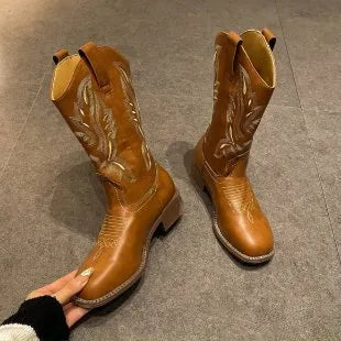 Brown embroidered women's mid-calf Martin boots on a waterproof platform with a square heel.