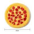 Yellow pizza slice squeaky plush dog chewing toy on white background