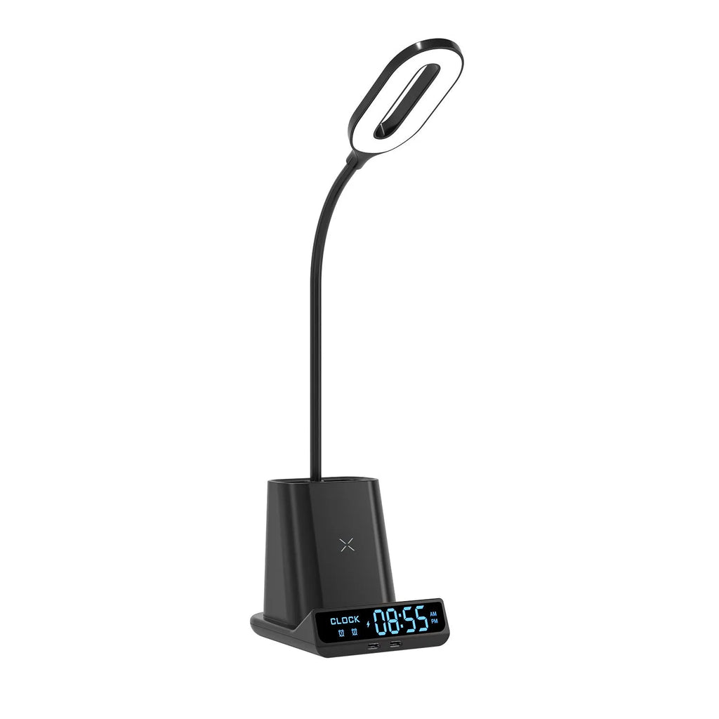 Modern black and white desk lamp with wireless charging pad, pen holder, and storage compartment.