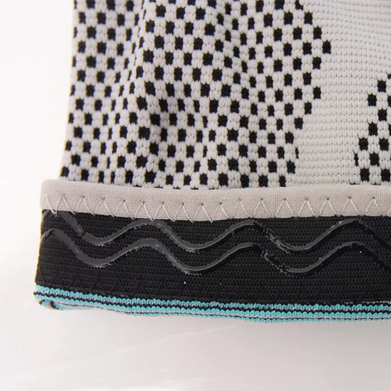Sky blue silicone running and basketball knee pads showing elastic fibre material on a neutral background.