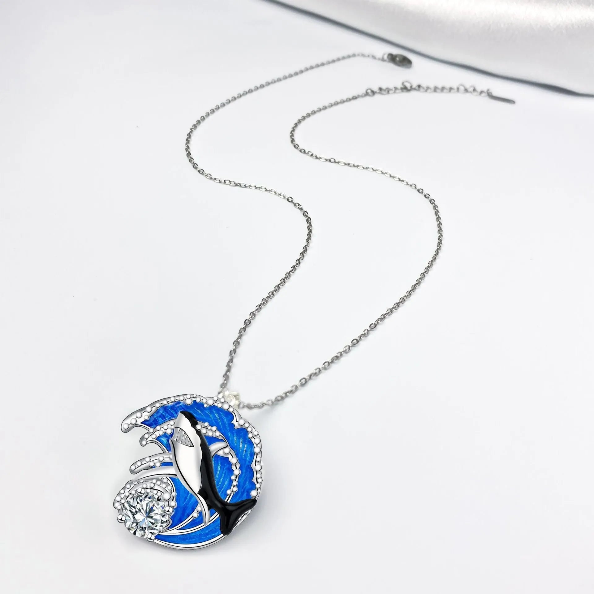 Shark pendant necklace with copper animal modelling on adjustable cross chain