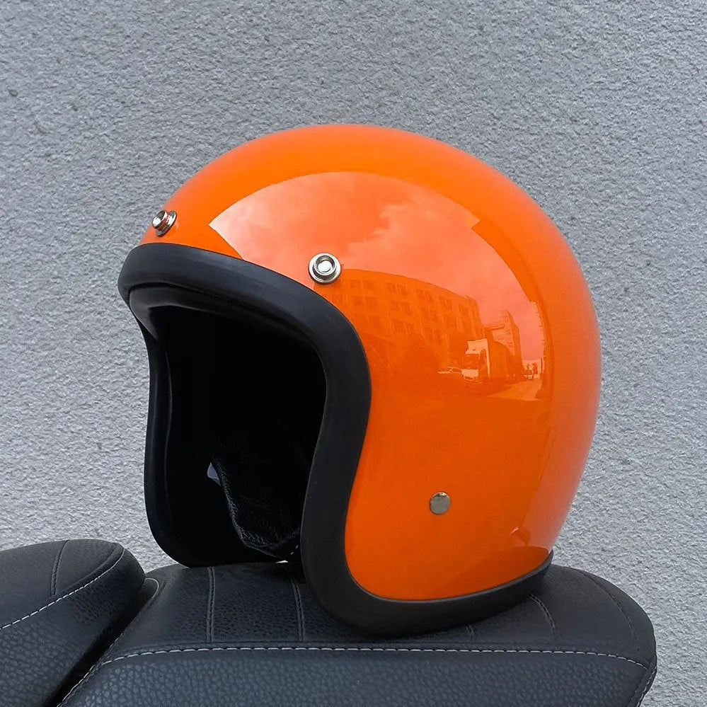 Retro-style fibreglass motorcycle half helmet shown in cement grey colour option