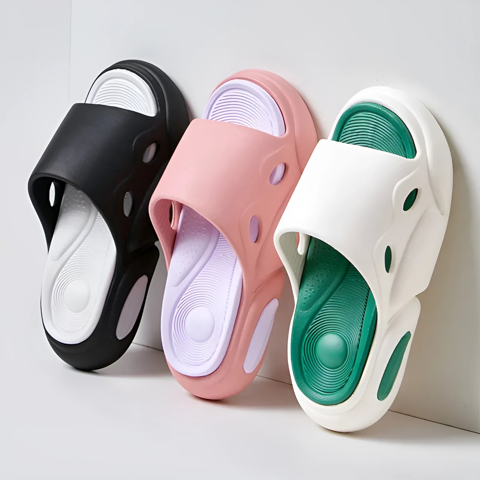 Two-colour couple slippers with thick EVA soles in pink purple, white green, and black white combinations