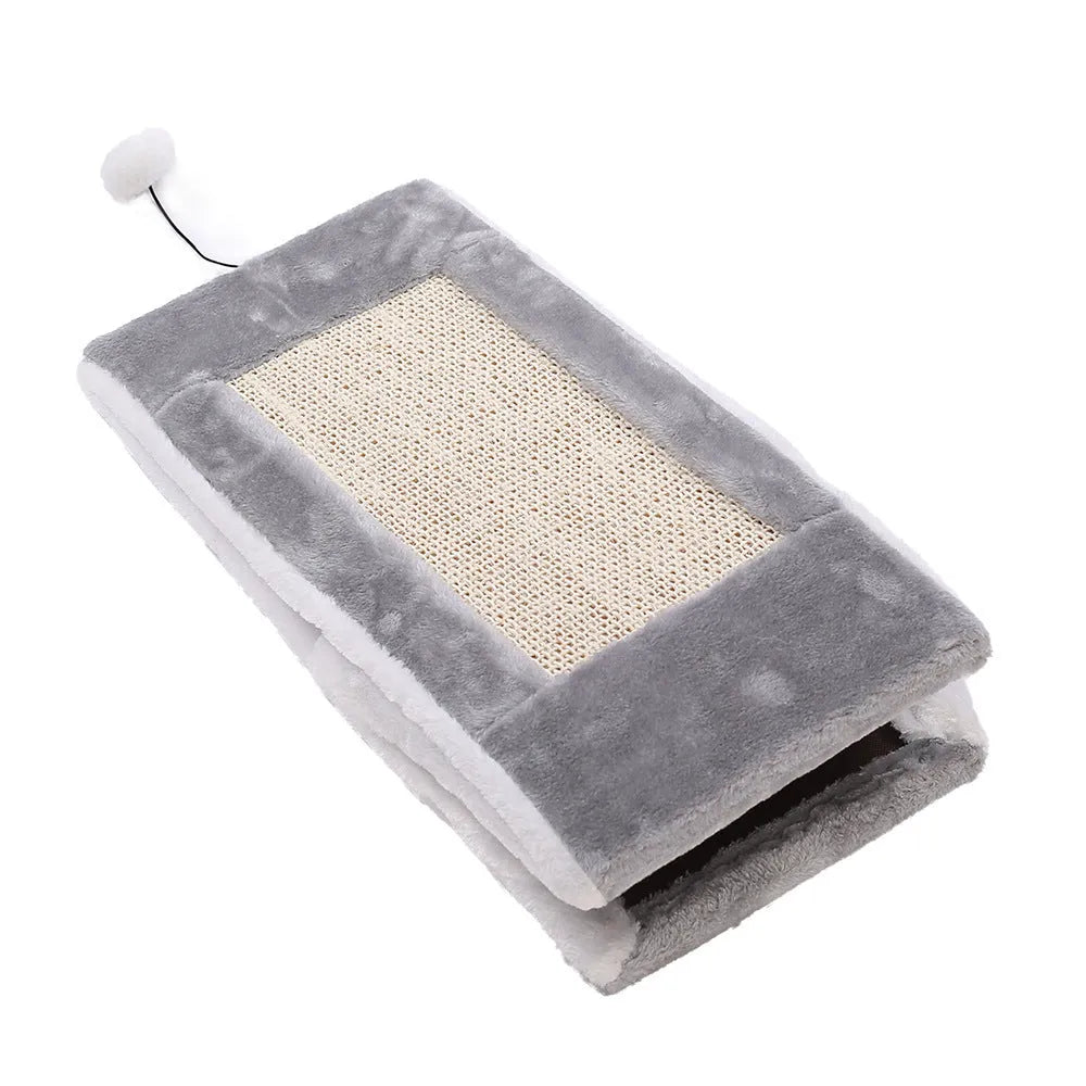 Grey and white triangular cat bed with sisal scratching posts on the sides.