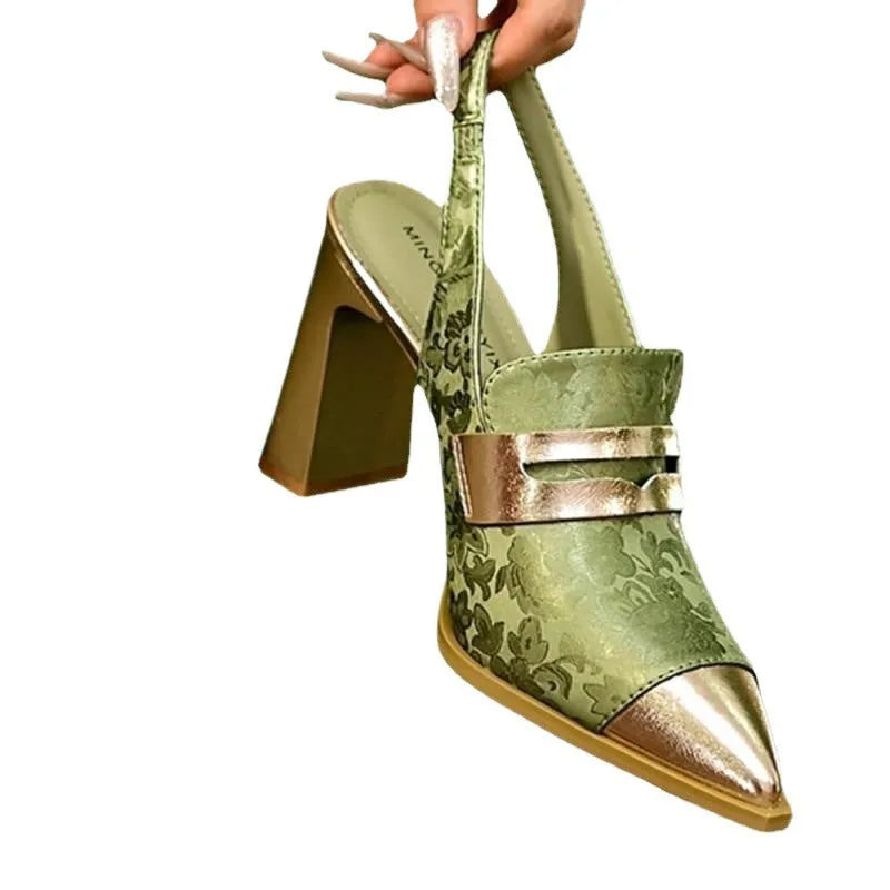 Women's black chunky heel high-cut sandals with pointed toe and elastic ankle strap.