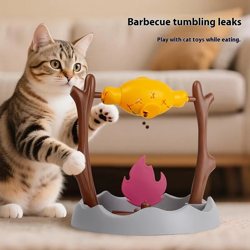 Barbecue-style tumbling cat treat feeder measuring 30x30x29cm with plastic construction