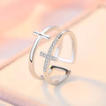 Women's adjustable copper ring with geometric double cross design and zircon stone inlay in silver setting