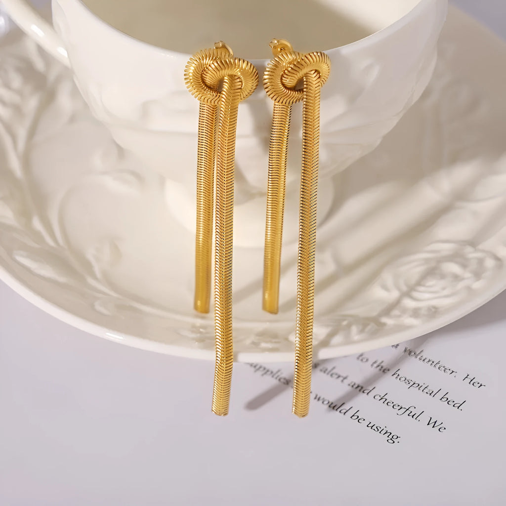 Gold knotted tassel pendant on titanium steel snake chain necklace with matching earrings