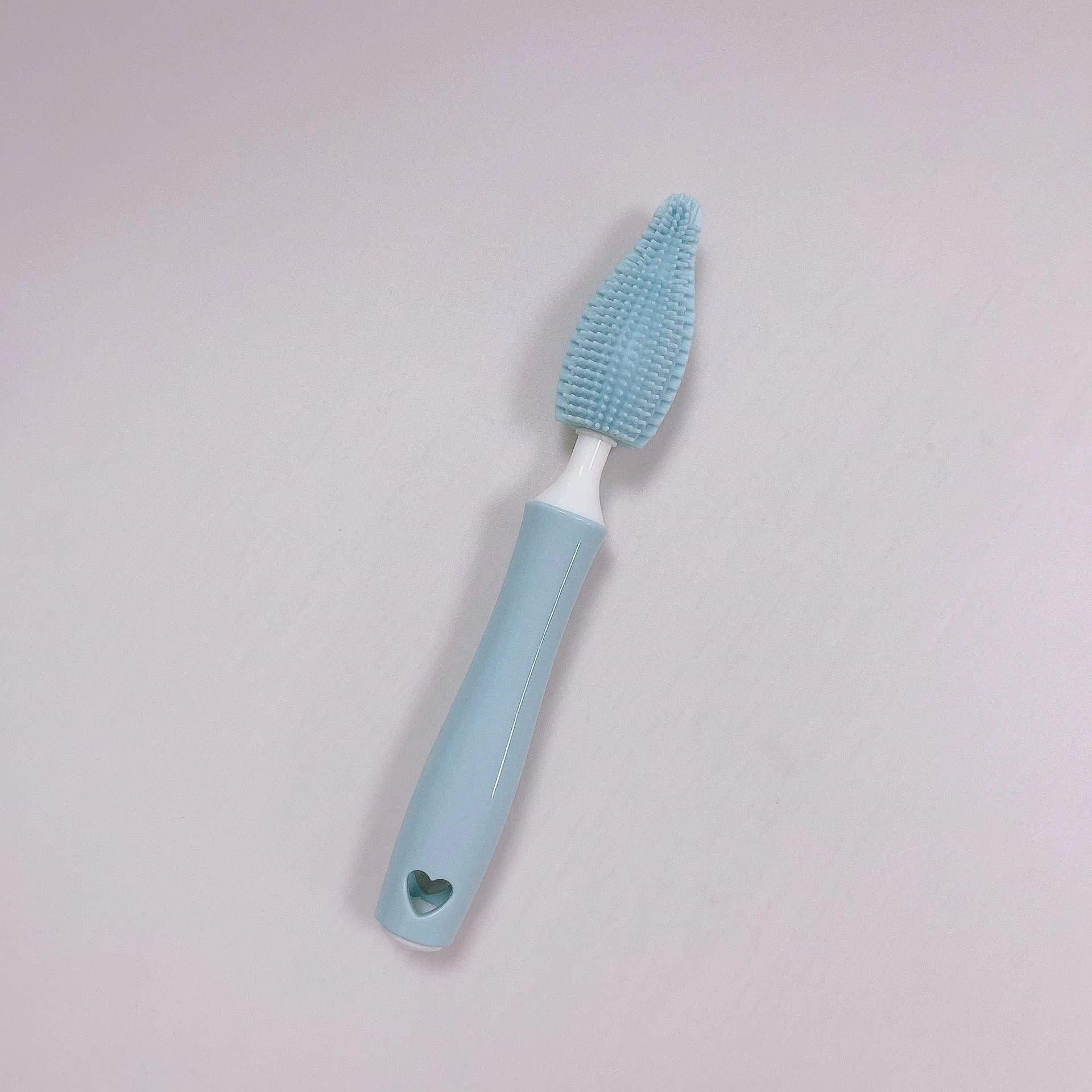 Silicone baby bottle brush and straw cleaning set in pink, blue, and yellow colour options