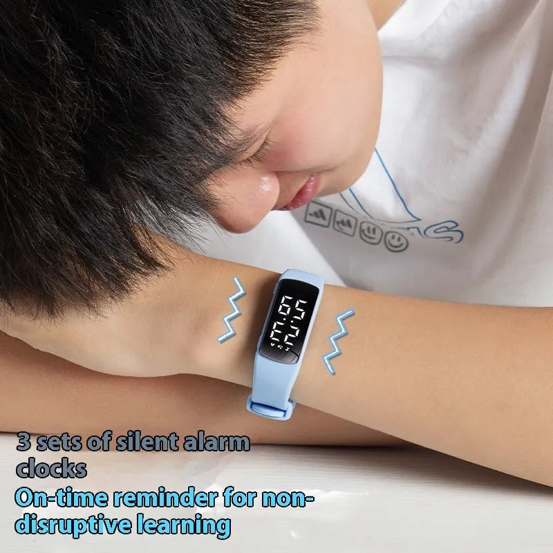 Smart waterproof electronic watch with vibration alarm on a silicone strap, showing an LED display.