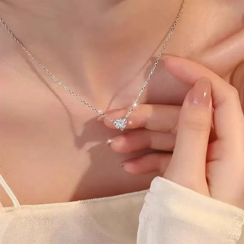 Women's copper necklace with heart-shaped pendant and polished silver finish