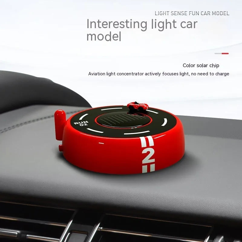 Round car shaped solar aromatherapy decoration for vehicle interiors in black, red or white colours
