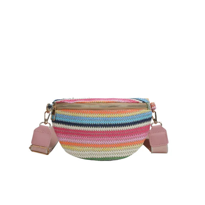 Women's straw woven beach bag with shell shape and single shoulder strap in pink colour option