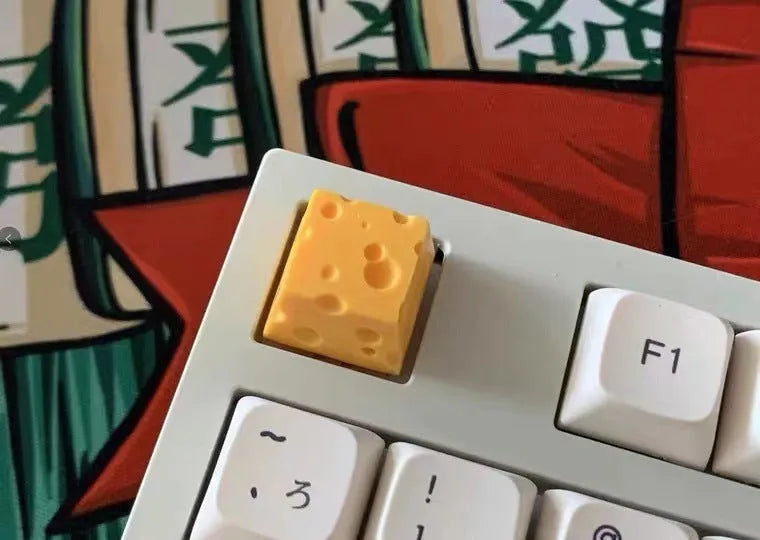 Yellow resin cheese wedge artisan keycap for mechanical keyboards with Cherry MX stem