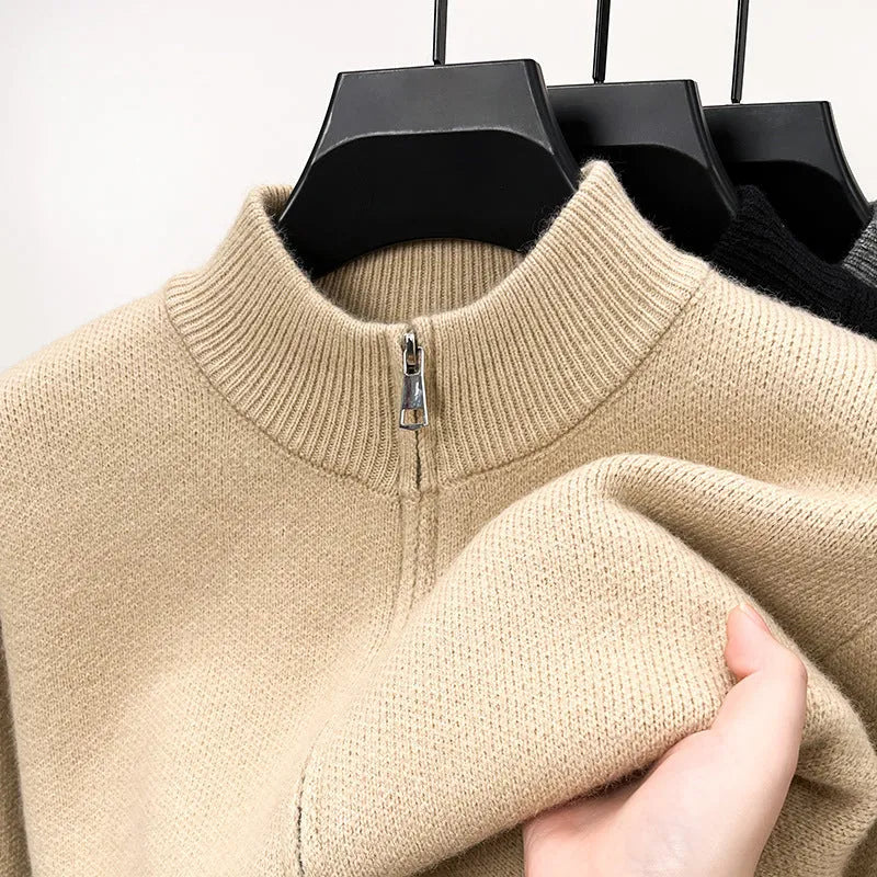 Men's loose fit knitted cardigan with a stand collar and full-length zip front in beige.