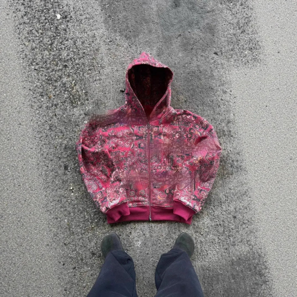 Man wearing a blue loose-fit hooded zip-up casual coat for autumn.