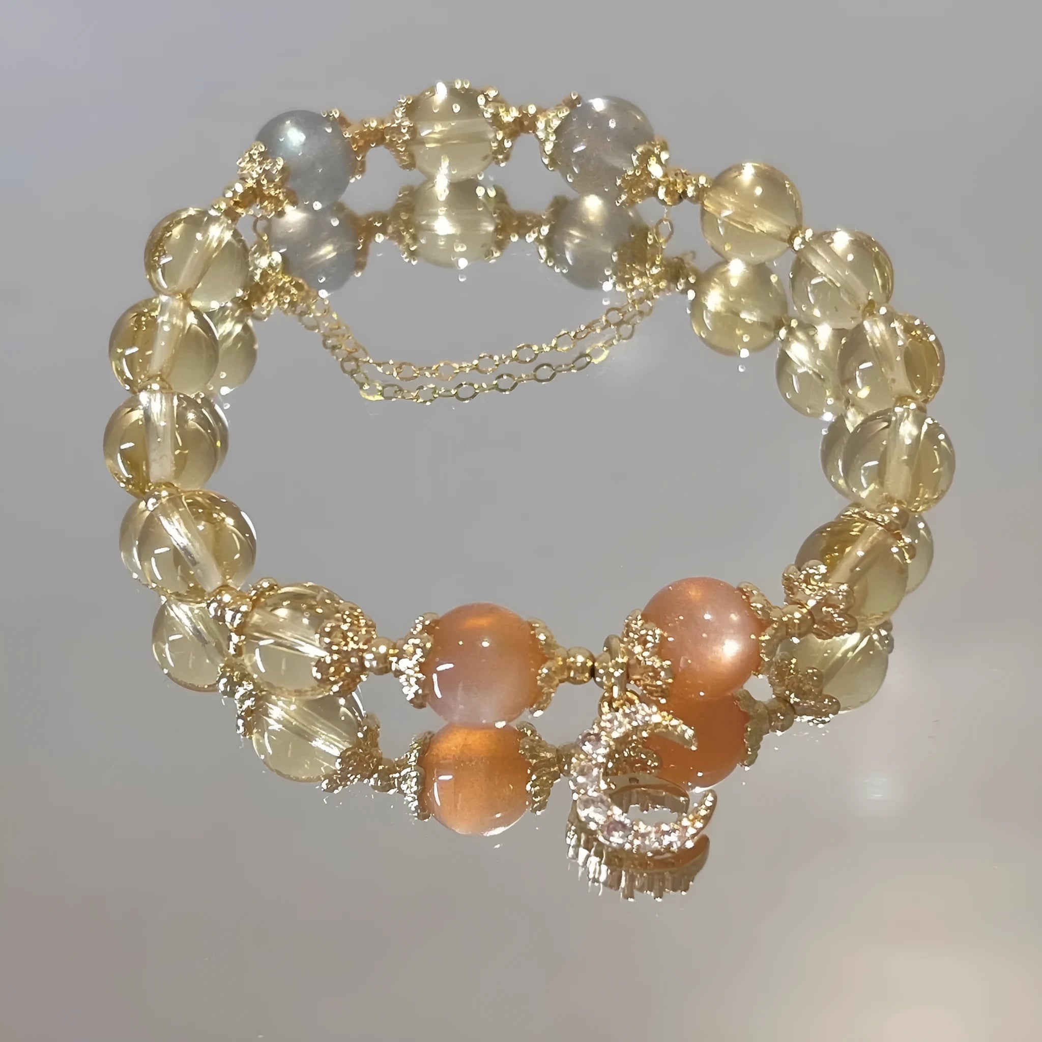 Chinese style women's crystal bracelet with electroplated 14K gold finish and diamond shape design