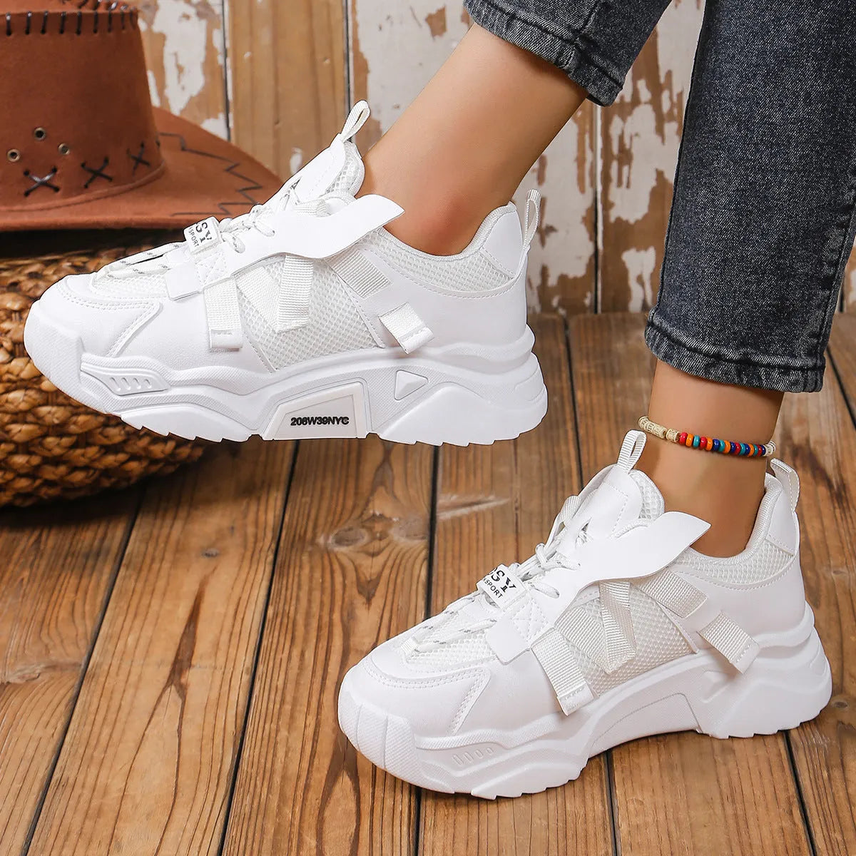 Women's purple mesh platform dad shoes with front lace-up design on a plain background.