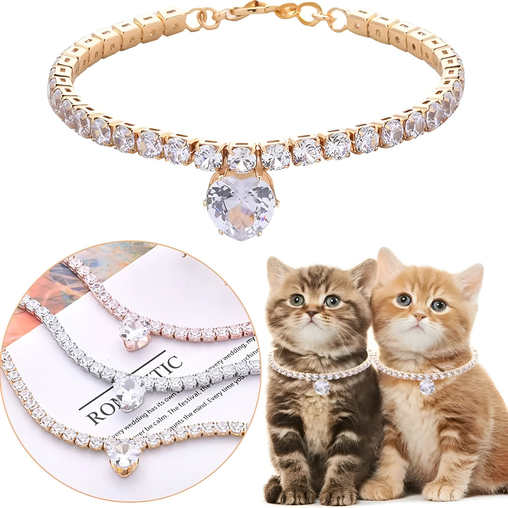Gold rhinestone heart-shaped collar for dogs or cats on a white background.