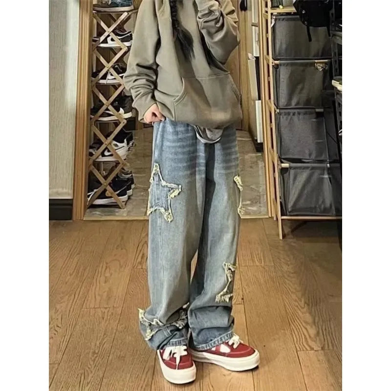 Blue high-waisted wide-leg denim jeans with straight cut on woman