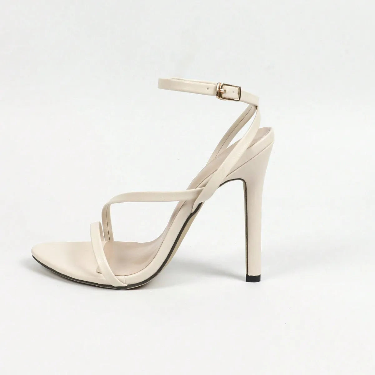 Women's gold high heel sandals with multi-stripe cross ankle straps and round open toe design