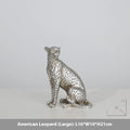 Modern leopard resin ornament sculpture in American Leopard colour on wooden shelf
