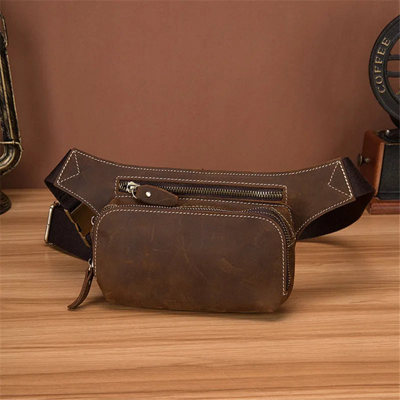 Brown cow leather men's sports waist bag showing internal phone pocket