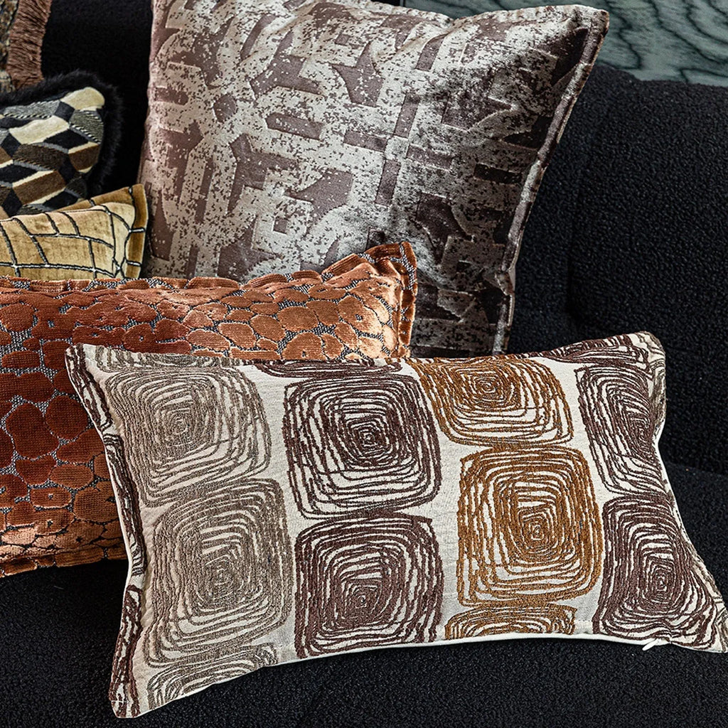 Cream and coffee-coloured abstract coil pattern pillow cover shown in square and rectangular sizes