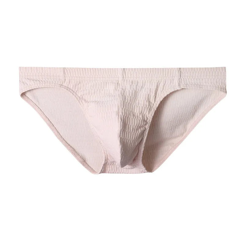 Men's solid colour cotton triangle briefs on a mid-waist, showing apricot, black, white and skin colour options.