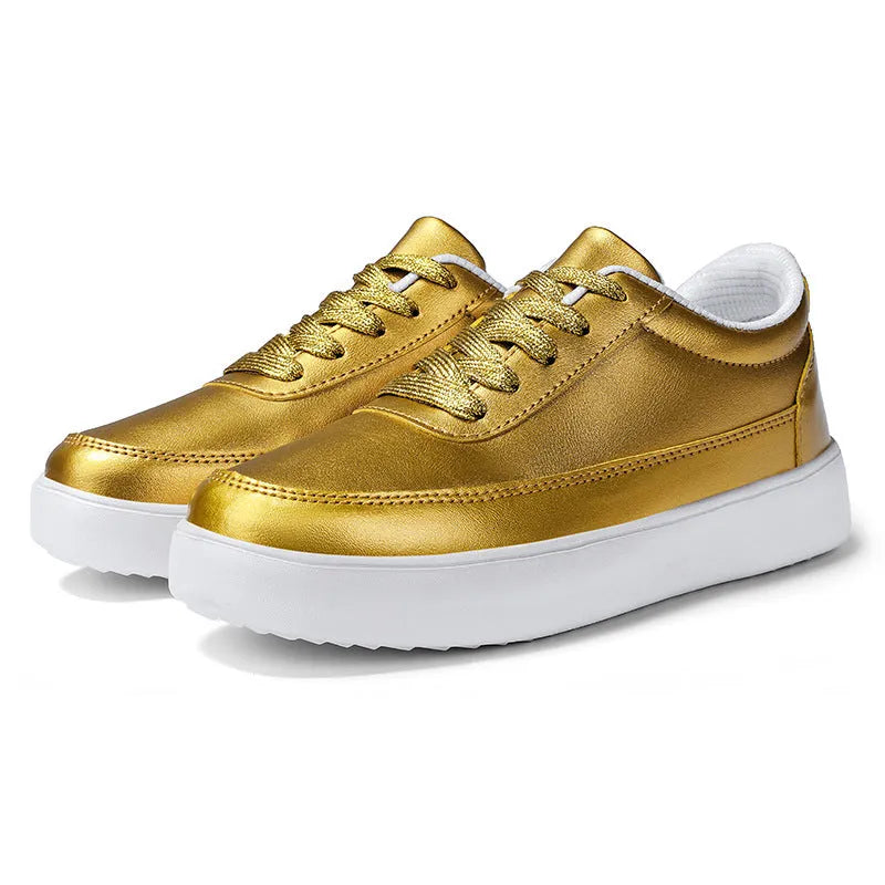 Women's gold leather lace-up casual flat shoes on a white background, showing front and side views.