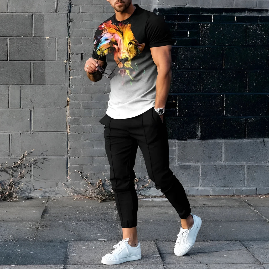 Man modelling a short-sleeved printed pullover and matching trousers from a lightweight polyester sports suit set.