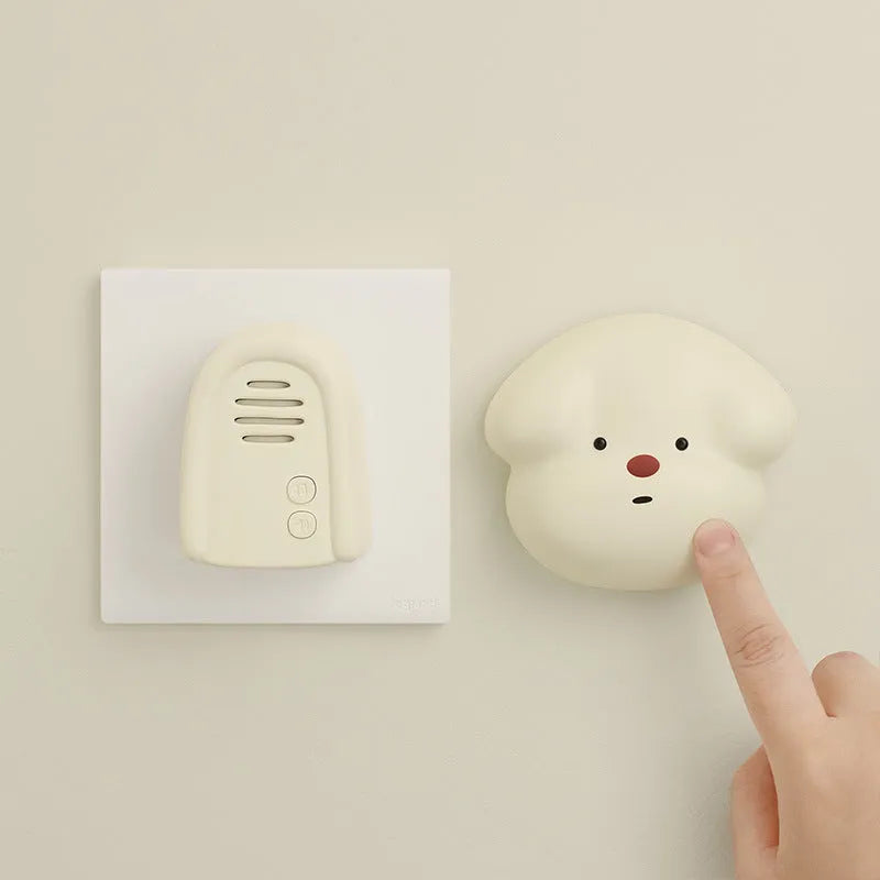 Plug-in wireless beeper doorbell in milky yellow or white colour for household use