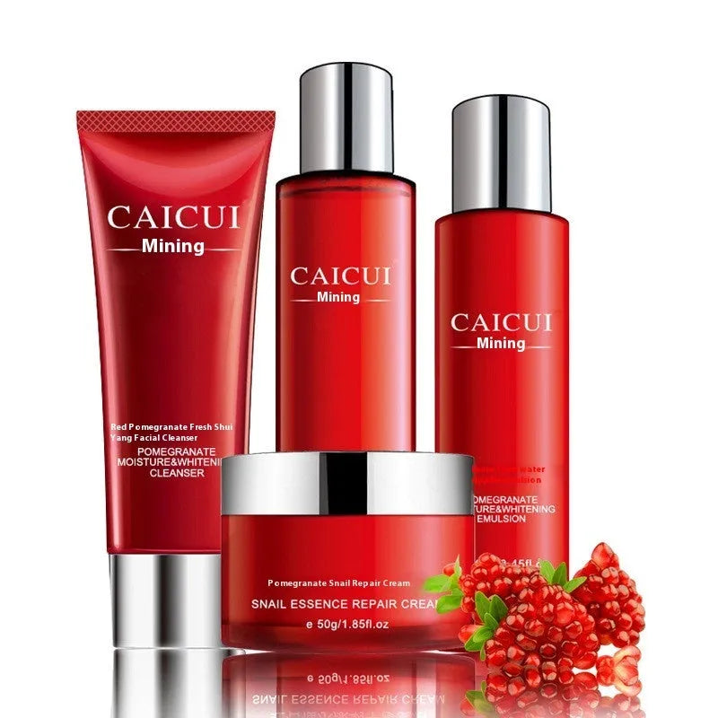 Red packaging for a four-piece pomegranate skincare set containing face wash, toner, lotion, and facial cream.