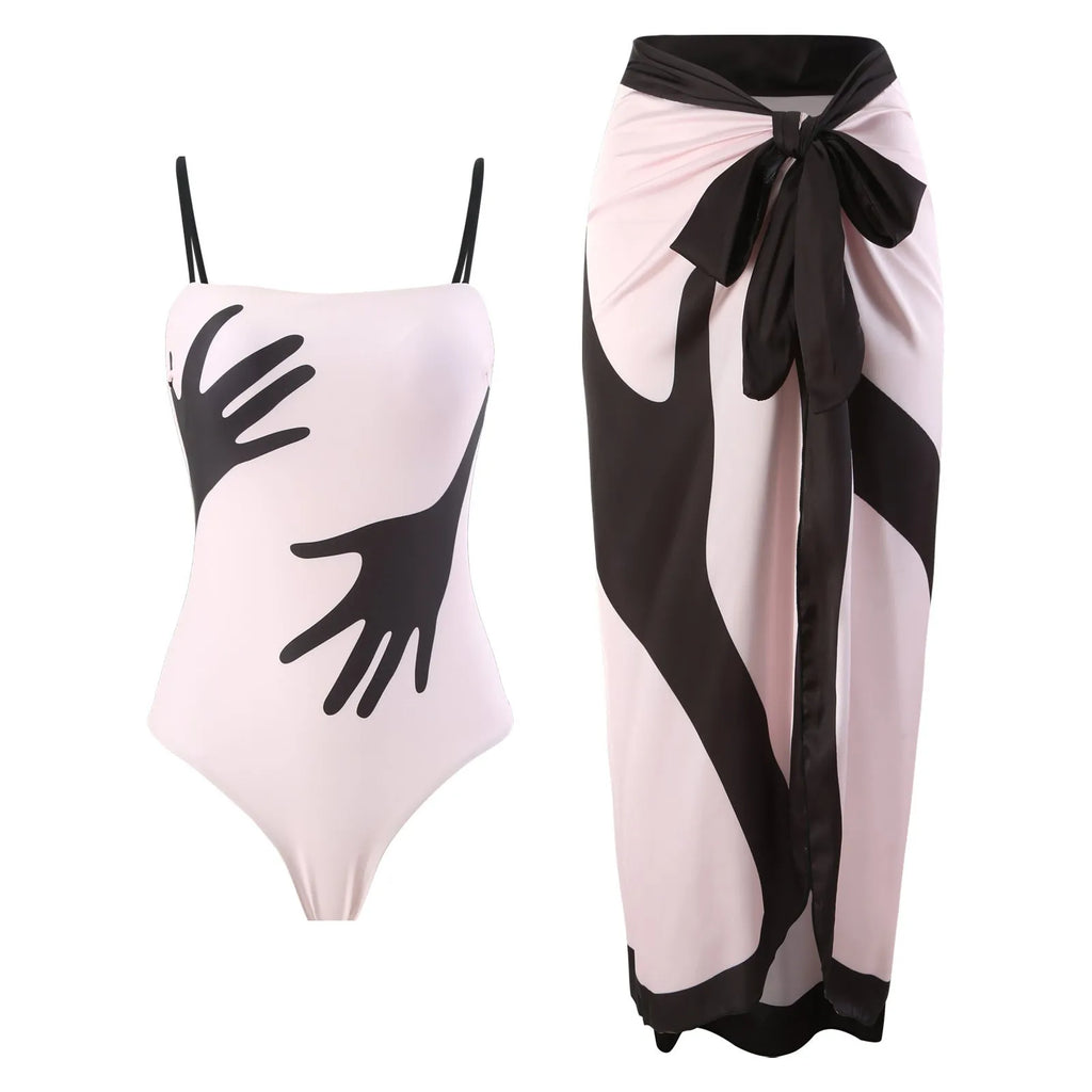 Women's patterned polyester bikini with attached sheer tulle skirt cover-up.