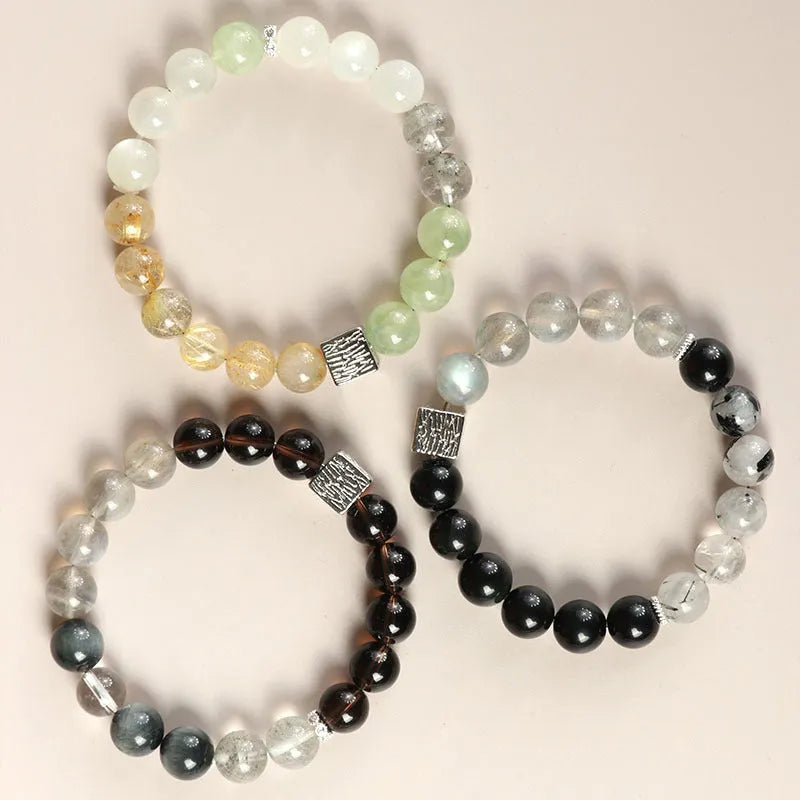 Khaki couple bracelet with Chinese geometric design in polished crystal, 10mm size.