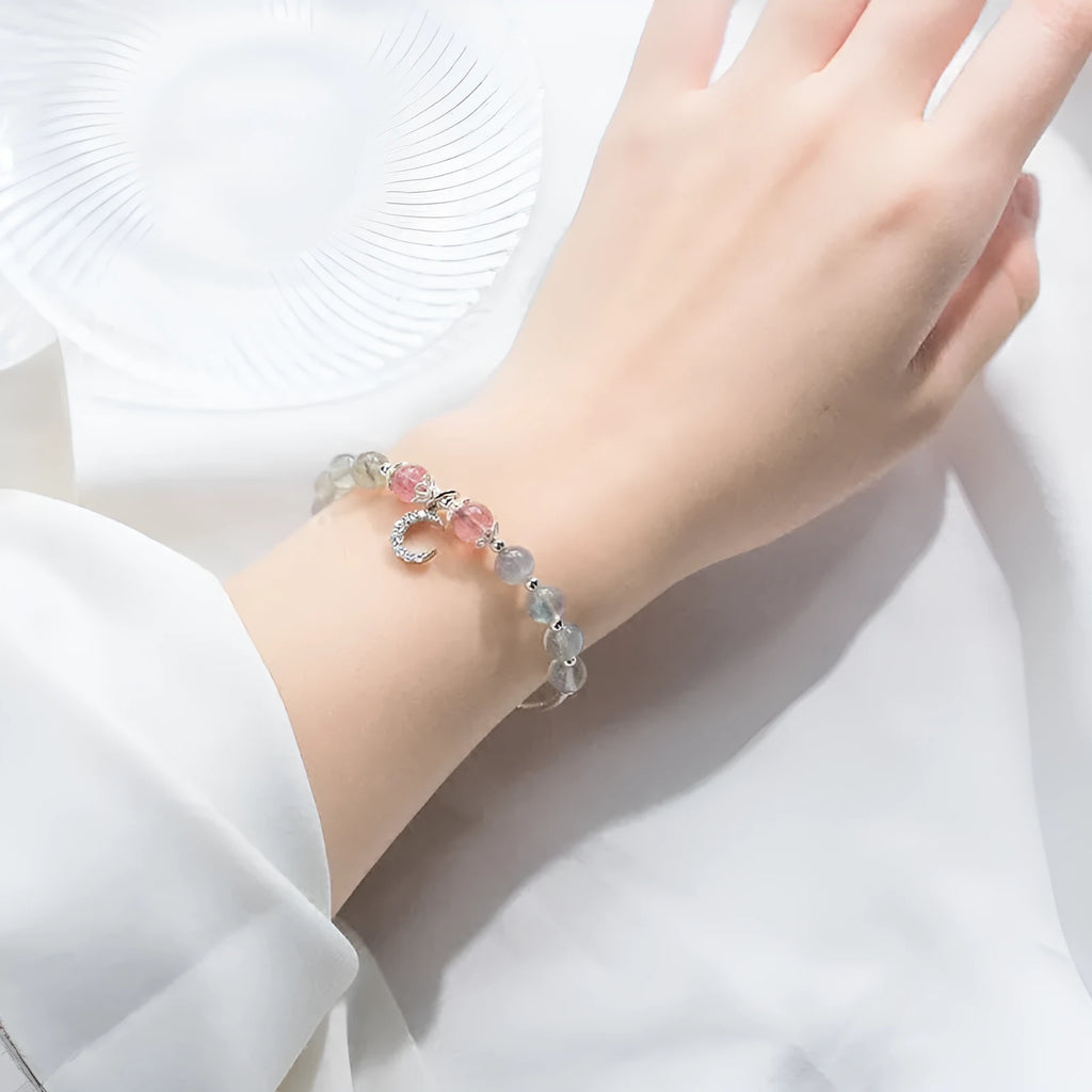 Handmade natural moonstone bracelet with crescent charm on adjustable 16-19cm chain